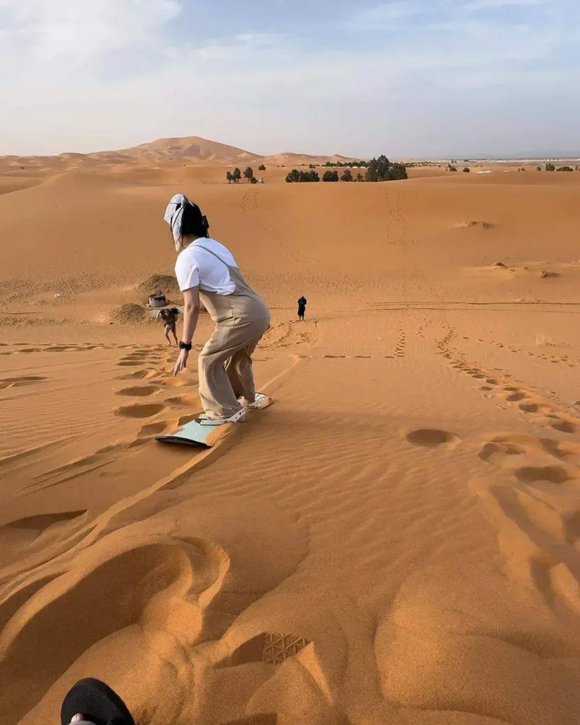 Sandboarding experience in Sahara Desert